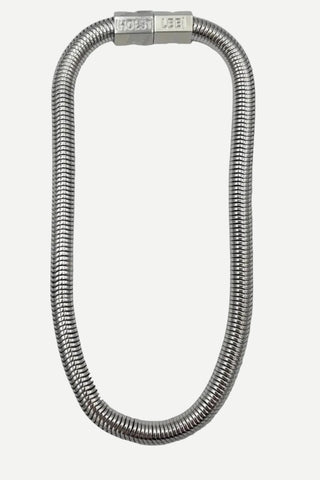 A silver-toned metal snake chain link bracelet with a rectangular clasp engraved with 'SPEED FEEL', shown on a plain white background.