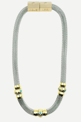 Necklace with gold and silver design on a white background